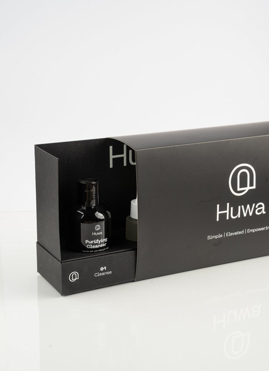 the cleanser with a feature of purifying showing in a black box with a logo and brandmark for the Huwa Skincare Brand